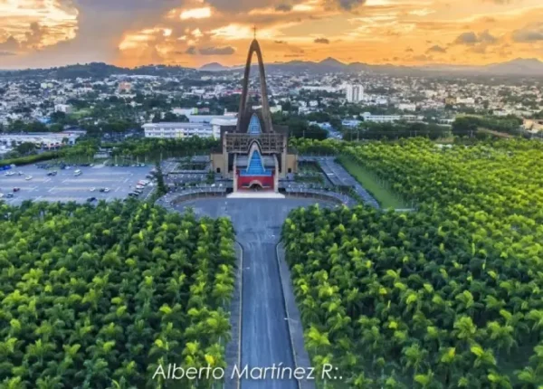 A large church with trees in the background