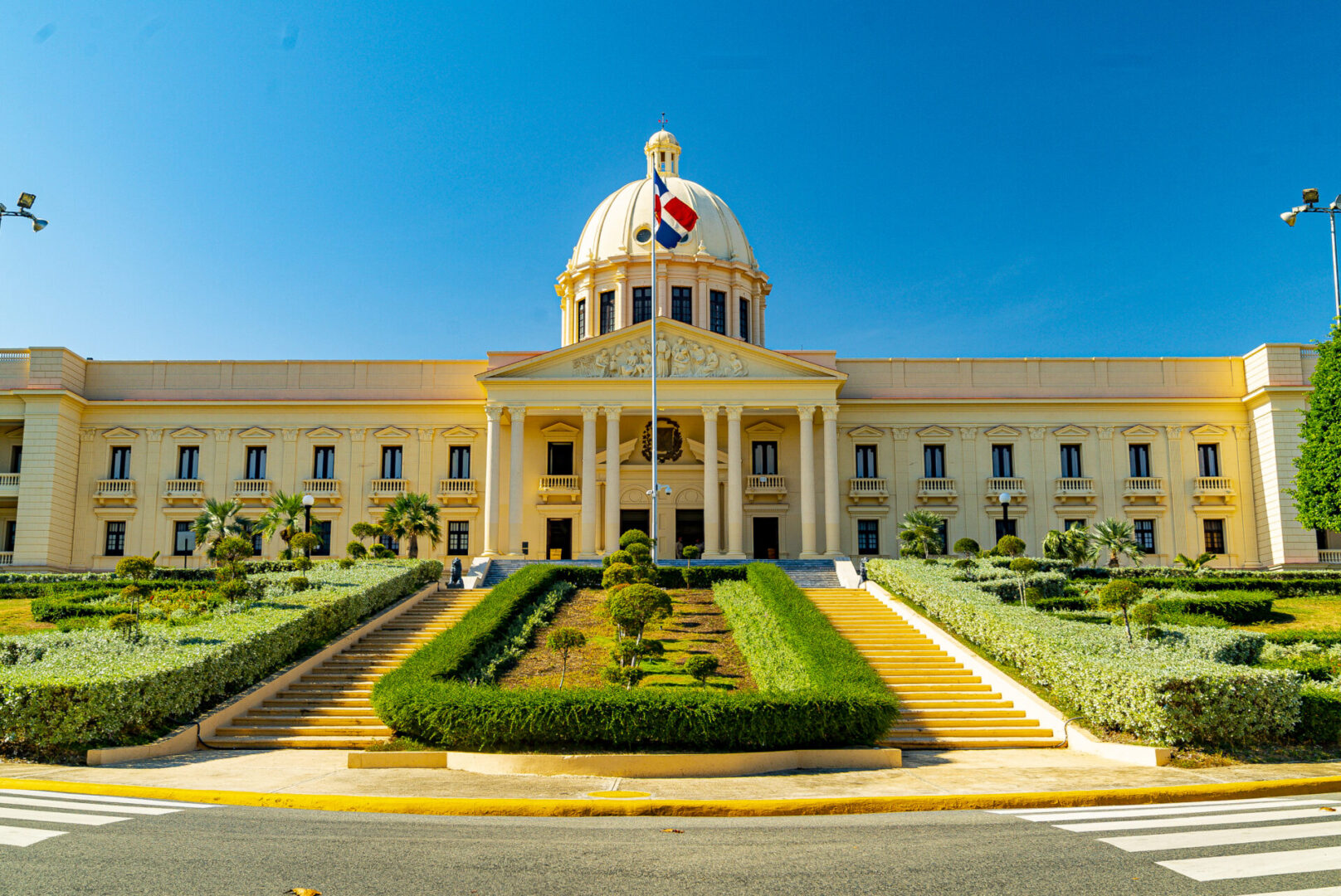 A large building with a garden in front of it