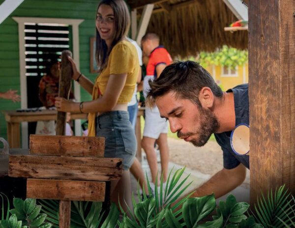 A man and woman working in a garden.