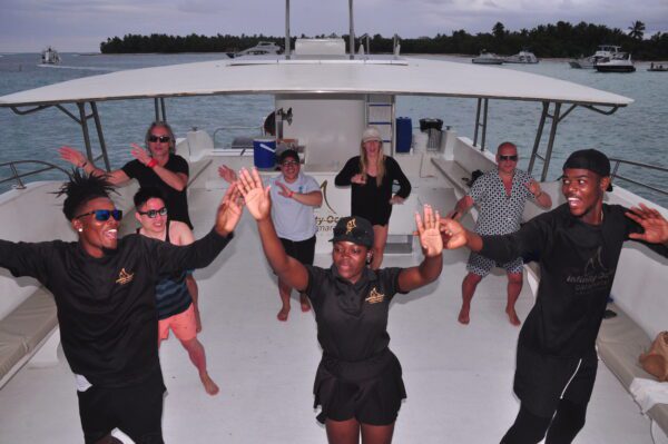 A group of people on the back of a boat.